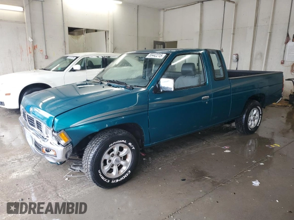 1997 Nissan Frontier XE with VIN 1N6SD16SXVC346717, listed as a Copart auction lot 55442215 with 112,343 mi miles and Salvage title. Bid and sale history available at DreamBid. Image 1.