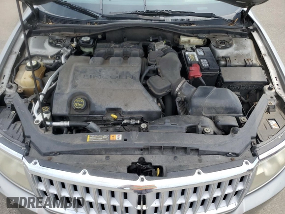 2008 Lincoln MKZ z VIN 3LNHM28TX8R622064, wystawiony jako Copart lot #59549055 z przebiegiem 83 092 mil mil oraz Szkoda całkowita • Salvage title. Historia ofert i sprzedaży dostępna na DreamBid. Obrazek 11.