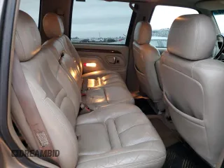 2000 Cadillac Escalade z VIN 1GYEK63R5YR219759, wystawiony jako Copart lot #86373734 z przebiegiem 190 307 mil mil oraz Szkoda całkowita • Salvage title. Historia ofert i sprzedaży dostępna na DreamBid. Obrazek 10.