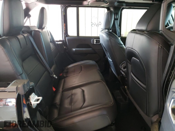 2023 Jeep Wrangler Sahara with VIN 1C4JJXP65PW627241, listed as a Copart auction lot 62873313 with 9,219 mi miles and Clean Title. Bid and sale history available at DreamBid. Image 11.