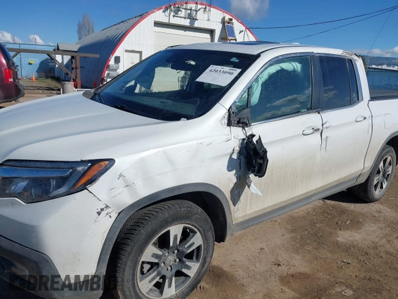 2020 Honda Ridgeline RTL with VIN 5FPYK3F50LB028430, listed as a IAAI auction lot 42033090 with Not provided miles and . Bid and sale history available at DreamBid. Image 6.