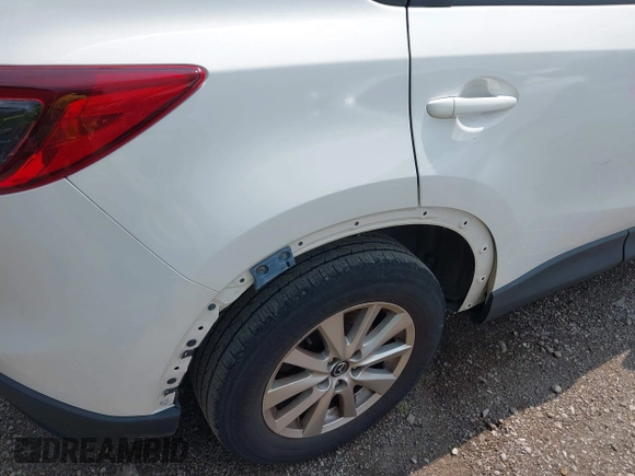 2016 Mazda CX-5 Sport with VIN JM3KE2BY6G0641051, listed as a IAAI auction lot 39959322 with 118,453 mi miles. Bid and sale history available at carsss.com. Image 14.