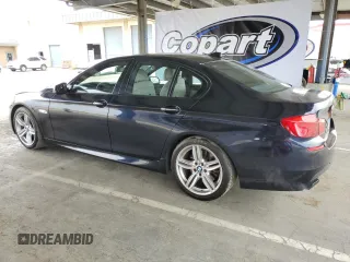 2013 BMW 5 Series 550i with VIN WBAFR9C52DDX80316, listed as a Copart auction lot 53540725 with 122,896 mi miles and Salvage Title. Bid and sale history available at carsss.com. Image 2.