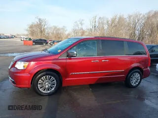 2015 Chrysler Town & Country Touring-L with VIN 2C4RC1CG7FR674321, listed as a IAAI auction lot 41750796 with 165,179 mi miles. Bid and sale history available at carsss.com. Image 14.