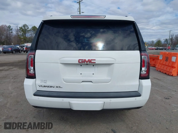2015 GMC Yukon XL SLT with VIN 1GKS1HKC7FR126375, listed as a IAAI auction lot 41689017 with 218,622 mi miles. Bid and sale history available at carsss.com. Image 16.