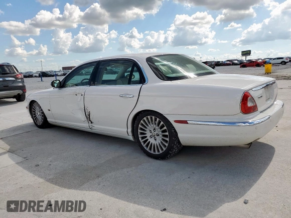 2006 Jaguar XJ Vanden Plas with VIN SAJWA82B16SH06996, listed as a Copart auction lot 62509025 with 80,236 mi miles and Salvage title. Bid and sale history available at DreamBid. Image 2.