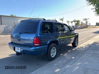 2002 Dodge Durango z VIN 1B4HR48N52F109342, wystawiony jako Copart lot #57185665 z przebiegiem 241 245 mil mil oraz Czysty tytuł • Clean title. Historia ofert i sprzedaży dostępna na DreamBid. Obrazek 4.