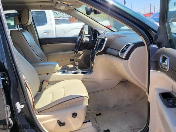 2014 Jeep Grand Cherokee Overland with VIN 1C4RJFCT7EC187319, listed as a Copart auction lot 52506115 with 98,314 mi miles and Clean Title. Bid and sale history available at carsss.com. Image 5.