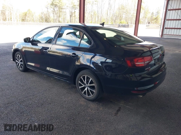 2016 Volkswagen Jetta Sedan 1.4T SE with VIN 3VWD67AJ8GM316539, listed as a IAAI auction lot 41870438 with 114,432 mi miles. Bid and sale history available at carsss.com. Image 3.