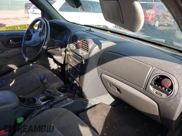 2004 GMC Envoy SLT with VIN 1GKDT13S742133932, listed as a IAAI auction lot 41598339 with 168,651 mi miles and . Bid and sale history available at DreamBid. Image 5.