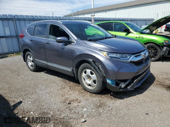 2019 Honda CR-V Touring with VIN 2HKRW2H90KH149664, listed as a Copart auction lot 52019525 with 147,649 mi miles and Salvage Title. Bid and sale history available at DreamBid. Image 4.