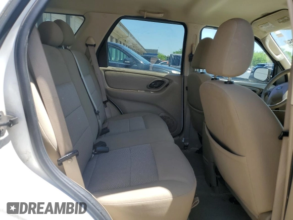 2006 Ford Escape XLT z VIN 1FMYU93176KB98889, wystawiony jako Copart lot #56388425 z przebiegiem 149 002 mil mil oraz Szkoda całkowita • Salvage title. Historia ofert i sprzedaży dostępna na DreamBid. Obrazek 11.