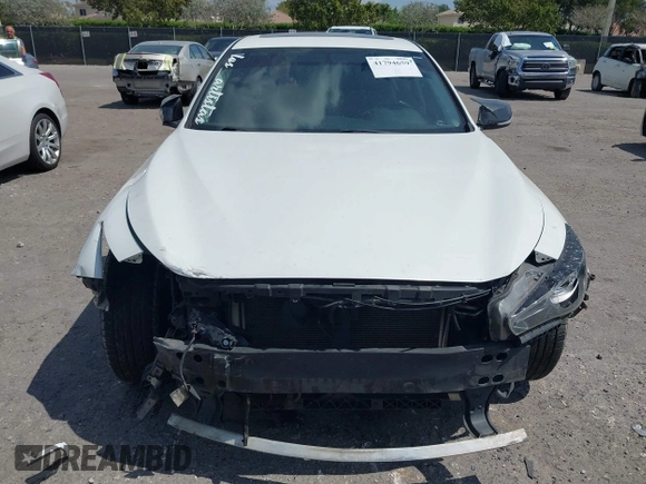 2014 Infiniti Q50 with VIN JN1BV7AP2EM671929, listed as a IAAI auction lot 41794659 with 77,930 mi miles. Bid and sale history available at carsss.com. Image 6.
