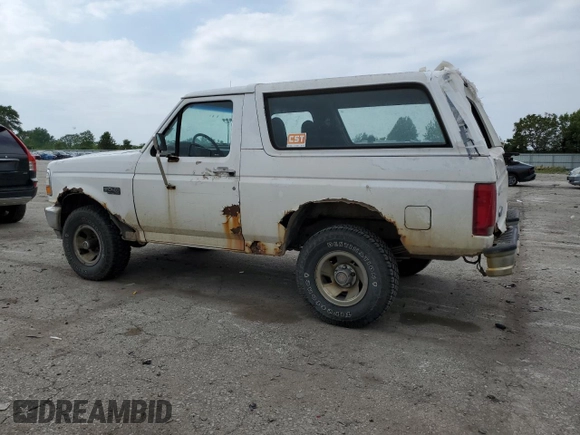 1996 Ford Bronco XL z VIN 1FMEU15N7TLB20204, wystawiony jako Copart lot #58887615 z przebiegiem 214 944 mil mil oraz Czysty tytuł • Clean title. Historia ofert i sprzedaży dostępna na DreamBid. Obrazek 2.