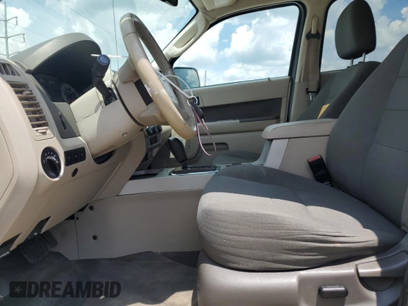 2009 Ford Escape Hybrid with VIN 1FMCU59309KC19243, listed as a Copart auction lot 61416915 with 74,732 mi miles and Salvage title. Bid and sale history available at DreamBid. Image 7.
