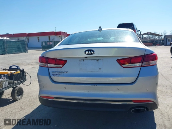 2016 Kia Optima LX with VIN 5XXGT4L37GG084538, listed as a IAAI auction lot 41784807 with 128,928 mi miles. Bid and sale history available at carsss.com. Image 16.