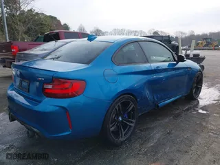 2017 BMW M2 with VIN WBS1H9C57HV886785, listed as a IAAI auction lot 41716752 with 63,388 mi miles. Bid and sale history available at carsss.com. Image 4.
