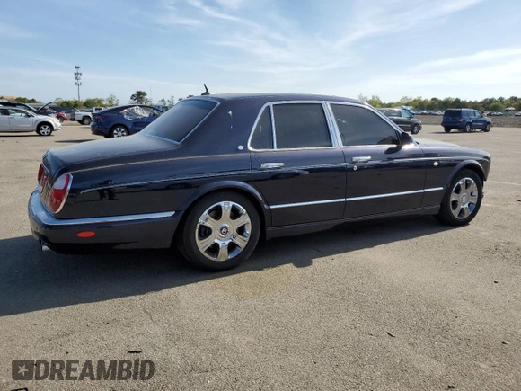 2005 Bentley Arnage R с VIN SCBLC37F15CX10517, выставлен на аукционе Copart как лот 54303364 с пробегом 116 865 миль миль и Списание • Salvage title. История ставок и продаж доступна на DreamBid. Изображение 3.