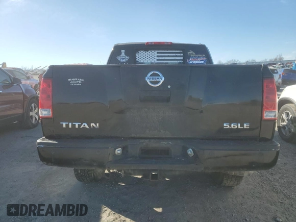 2005 Nissan Titan LE with VIN 1N6AA07B15N555054, listed as a Copart auction lot 42713855 with 213,169 mi miles and Salvage Title. Bid and sale history available at carsss.com. Image 6.