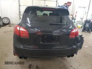 2014 Porsche Cayenne z VIN WP1AA2A25ELA91302, wystawiony jako Copart lot #59386795 z przebiegiem 161 865 mil mil oraz Szkoda całkowita • Salvage title. Historia ofert i sprzedaży dostępna na DreamBid. Obrazek 6.