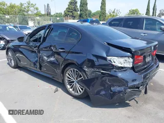 2018 BMW 5 Series 530i with VIN WBAJA5C51JG898278, listed as a IAAI auction lot 42595701 with 96,777 mi miles and . Bid and sale history available at DreamBid. Image 3.