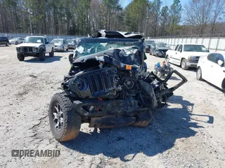 2020 Jeep Wrangler Unlimited Rubicon with VIN 1C4HJXFG2LW147242, listed as a IAAI auction lot 41630952 with Not provided miles and . Bid and sale history available at DreamBid. Image 6.