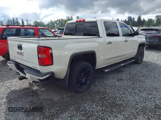 2014 GMC Sierra 1500 Denali z VIN 3GTU2WEJXEG527496, wystawiony jako IAAI lot #42211521 z przebiegiem 151 974 mil mil oraz . Historia ofert i sprzedaży dostępna na DreamBid. Obrazek 4.