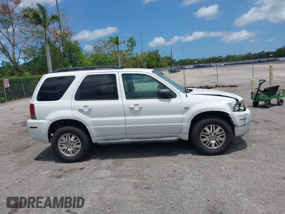 2006 Mercury Mariner Luxury with VIN 4M2YU56116KJ14472, listed as a IAAI auction lot 42349564 with 96,221 mi miles and . Bid and sale history available at DreamBid. Image 13.
