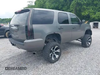 2007 Chevrolet Tahoe LT with VIN 1GNFK13017J290475, listed as a IAAI auction lot 42352808 with 148,086 mi miles and . Bid and sale history available at DreamBid. Image 4.