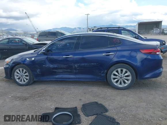 2018 Kia Optima LX z VIN 5XXGT4L32JG205418, wystawiony jako IAAI lot #42062997 z przebiegiem 103 126 mil mil oraz . Historia ofert i sprzedaży dostępna na DreamBid. Obrazek 6.