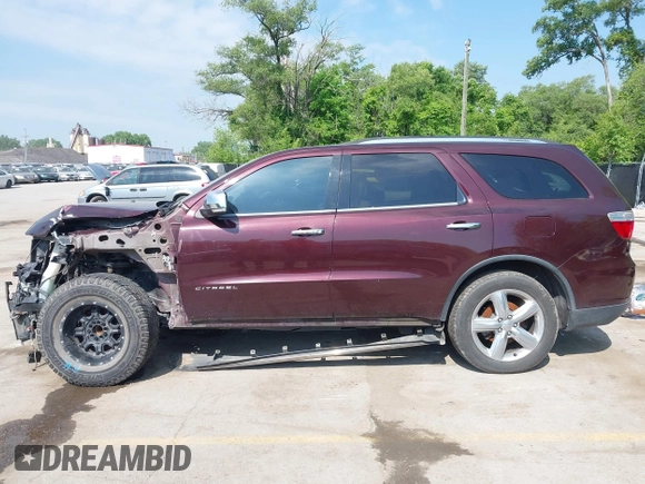 2012 Dodge Durango Citadel with VIN 1C4SDHET1CC275636, listed as a IAAI auction lot 42266742 with 212,030 mi miles and . Bid and sale history available at DreamBid. Image 14.