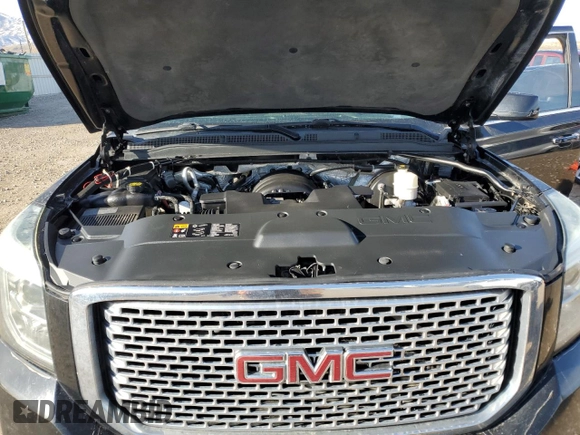 2015 GMC Yukon XL Denali with VIN 1GKS2JKJ6FR592902, listed as a Copart auction lot 81809144 with 226,718 mi miles and Clean Title. Bid and sale history available at DreamBid. Image 12.