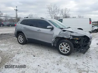 2016 Jeep Cherokee 75th Anniversary with VIN 1C4PJLCB1GW297555, listed as a IAAI auction lot 41232269 with 257,033 mi miles. Bid and sale history available at carsss.com. Image 13.