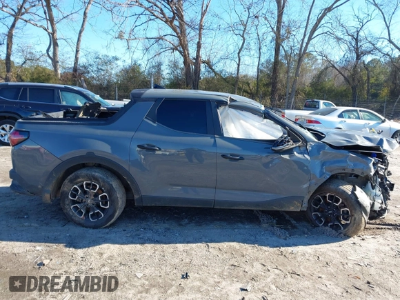 2022 Hyundai Santa Cruz SEL with VIN 5NTJB4AE7NH014148, listed as a IAAI auction lot 41263713 with 70,619 mi miles and . Bid and sale history available at DreamBid. Image 13.