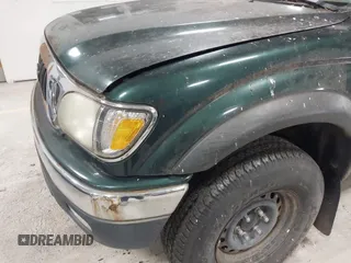 2003 Toyota Tacoma with VIN 5TEWN72N03Z166634, listed as a IAAI auction lot 41987641 with Not Provided miles. Bid and sale history available at carsss.com. Image 6.