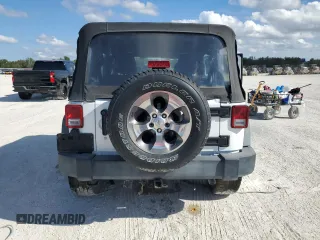 2018 Jeep Wrangler JK Unlimited Sport S with VIN 1C4BJWDG6JL811267, listed as a Copart auction lot 86688384 with 60,882 mi miles and Non Repairable. Bid and sale history available at carsss.com. Image 6.