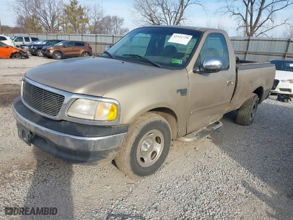 1999 Ford F-150 Work Series with VIN 1FTRF17W9XNB77925, listed as a IAAI auction lot 41511738 with 136,735 mi miles. Bid and sale history available at carsss.com. Image 2.