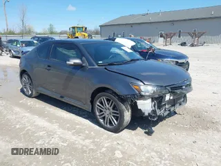 2012 Scion tC with VIN JTKJF5C70C3033990, listed as a IAAI auction lot 41996333 with 126,537 mi miles. Bid and sale history available at carsss.com. Image 1.