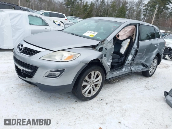 2012 Mazda CX-9 Grand Touring with VIN JM3TB3DV2C0353558, listed as a IAAI auction lot 41397266 with 158,843 mi miles and . Bid and sale history available at DreamBid. Image 2.