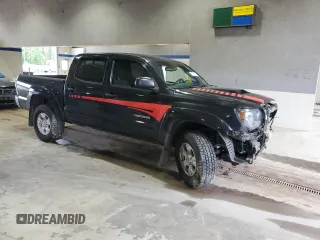 2010 Toyota Tacoma PreRunner with VIN 3TMJU4GN3AM097601, listed as a Copart auction lot 57703415 with 227,978 mi miles and Salvage title. Bid and sale history available at DreamBid. Image 4.