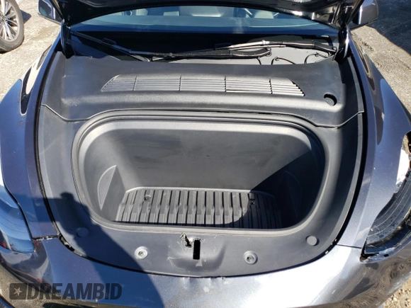 2024 Tesla Model Y with VIN 7SAYGDED3RF114643, listed as a Copart auction lot 56557075 with 3,021 mi miles and Salvage Title. Bid and sale history available at DreamBid. Image 11.