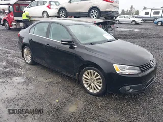 2014 Volkswagen Jetta TDI w/Premium with VIN 3VWLL7AJ1EM406360, listed as a IAAI auction lot 41857580 with 93,333 mi miles and . Bid and sale history available at DreamBid. Image 1.