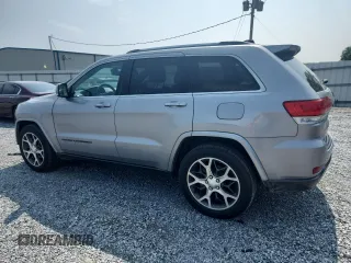 2018 Jeep Grand Cherokee Limited z VIN 1C4RJEBG4JC281330, wystawiony jako Copart lot #57954545 z przebiegiem 63 035 mil mil oraz Szkoda całkowita • Salvage title. Historia ofert i sprzedaży dostępna na DreamBid. Obrazek 2.