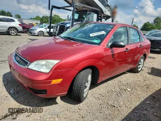 2005 Ford Focus S with VIN 1FAFP34N85W187592, listed as a Copart auction lot 64759925 with 27,051 mi miles and Clean title. Bid and sale history available at DreamBid. Image 1.