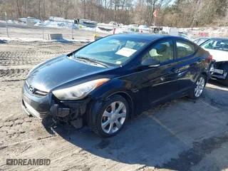 2013 Hyundai Elantra GLS PZEV with VIN KMHDH4AE4DU574977, listed as a IAAI auction lot 41608098 with 116,899 mi miles. Bid and sale history available at carsss.com. Image 18.