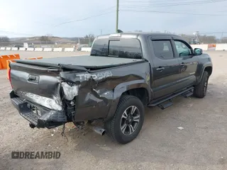 2018 Toyota Tacoma SR with VIN 3TMCZ5AN0JM150540, listed as a IAAI auction lot 41683174 with 78,553 mi miles and . Bid and sale history available at DreamBid. Image 4.