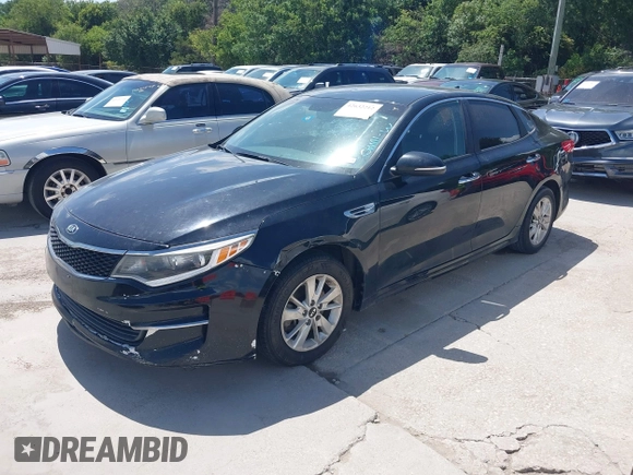 2016 Kia Optima LX with VIN 5XXGT4L34GG084495, listed as a IAAI auction lot 42633502 with 148,038 mi miles and . Bid and sale history available at DreamBid. Image 2.