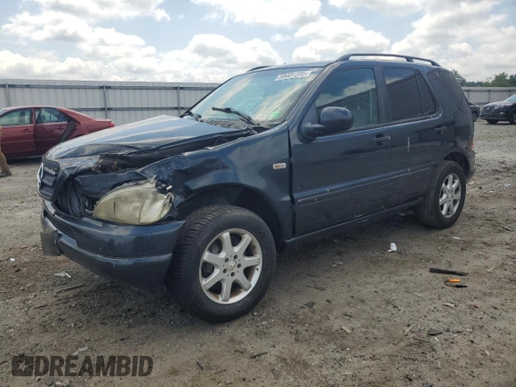 2000 Mercedes-Benz M 320/430/500 with VIN 4JGAB72E7YA168445, listed as a Copart auction lot 59401235 with 231,591 mi miles and Salvage title. Bid and sale history available at DreamBid. Image 1.