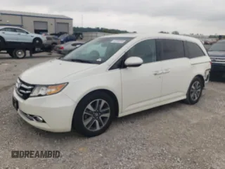 2016 Honda Odyssey Touring Elite with VIN 5FNRL5H9XGB027183, listed as a Copart auction lot 62338285 with 199,114 mi miles and Salvage title. Bid and sale history available at DreamBid. Image 1.