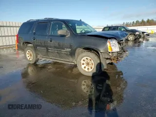 2014 GMC Yukon SLT with VIN 1GKS2CE02ER211527, listed as a Copart auction lot 84617034 with 173,977 mi miles and Salvage Title. Bid and sale history available at DreamBid. Image 11.